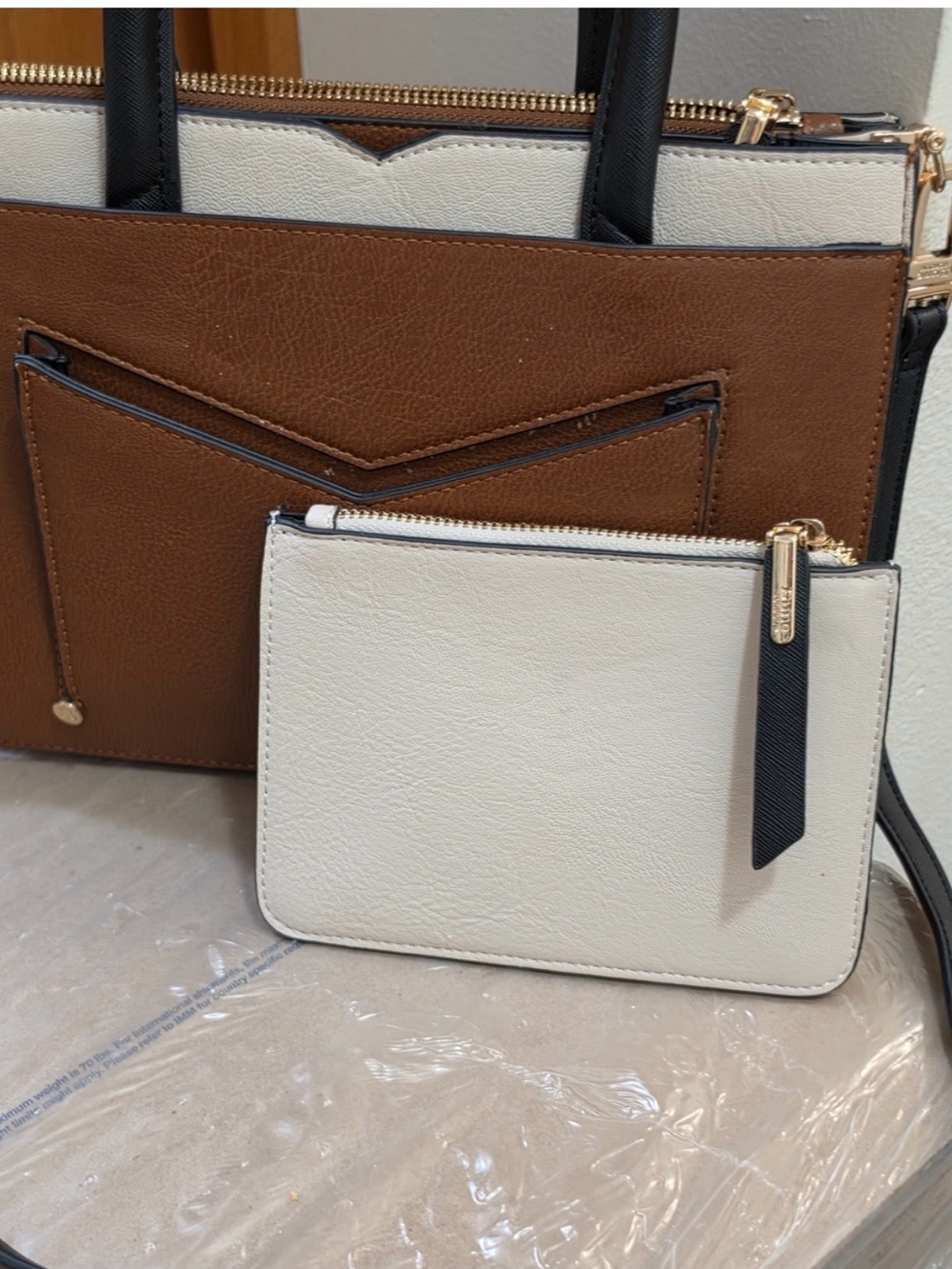 Dune cosmetic satchel in brown, cream and black leather authentic. NWOT